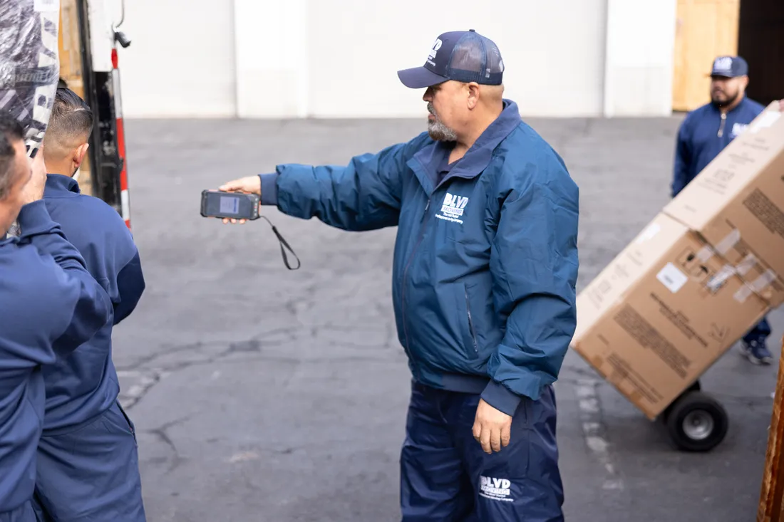 BLVD team member documenting moving inventory