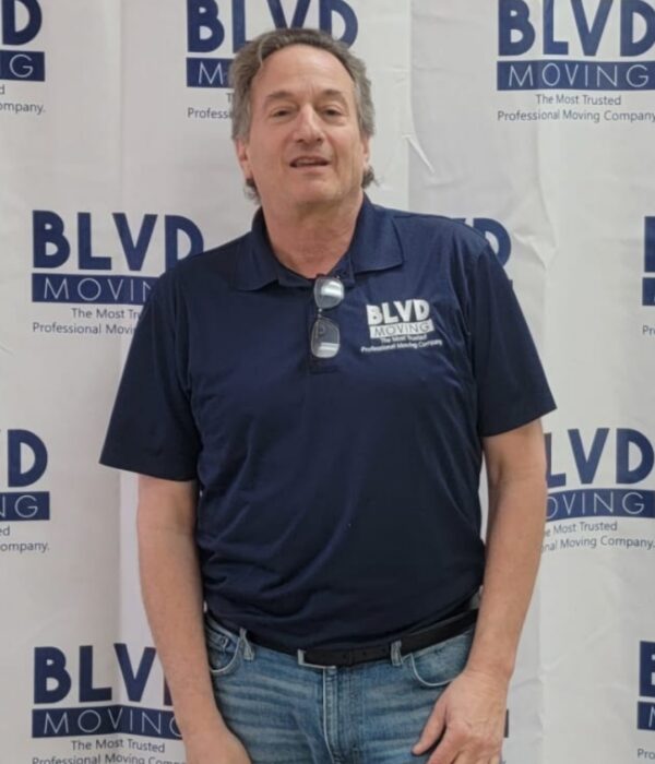 A photo of Matthew Freedman, the VP of Sales for BLVD Moving